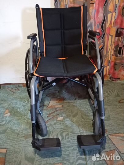 Инвалидная коляска