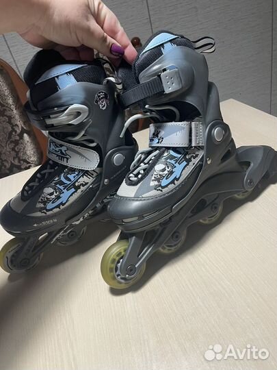 Роликовые коньки