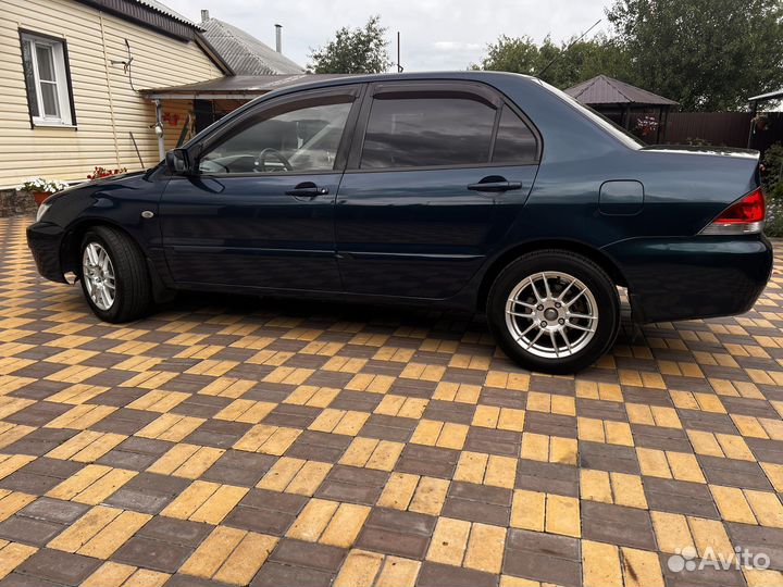 Mitsubishi Lancer 1.6 МТ, 2008, 249 750 км