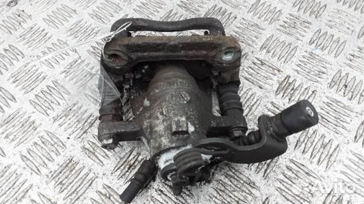 Суппорт тормозной задний левый KIA CEE'D 2 (JD) (4