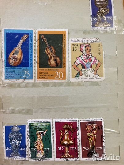 Марки почтовые разных стран в книге