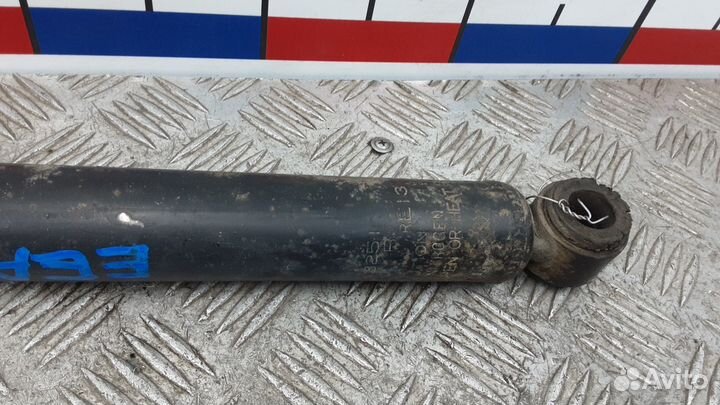 Амортизатор задний Mitsubishi L200 4 (2006–2015)