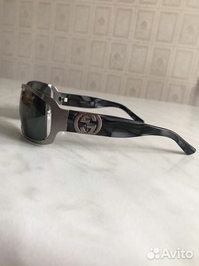 Солнцезащитные очки брендовые