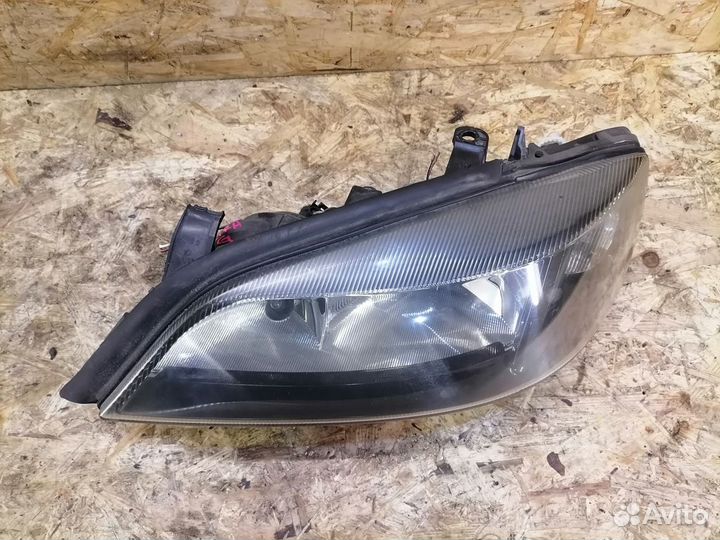 Фара левая Opel Astra G