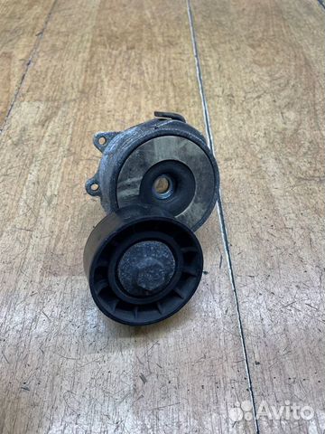 Натяжной ролик приводного ремня Opel Astra H