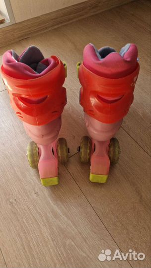 Роликовые коньки