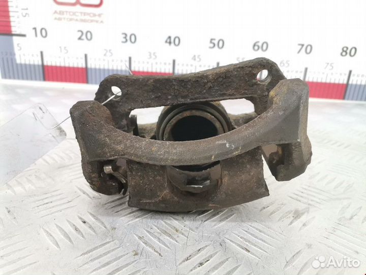 Суппорт передний правый Ford Fiesta 5 рест. 2010