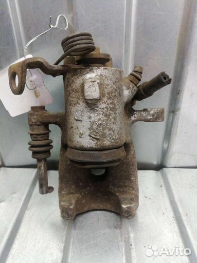 Суппорт тормозной задний левый Opel Zafira B 1.7