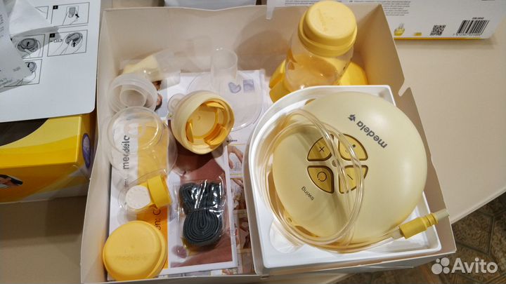 Молокоотсос Medela swing электрический