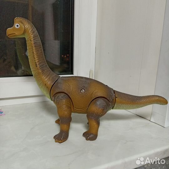 Игрушка динозавр большой