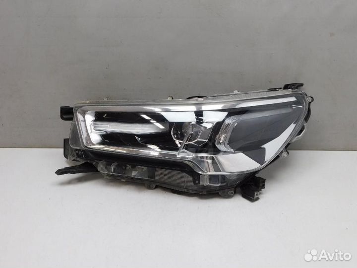Фара левая Toyota Hilux Pick Up