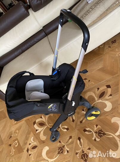 Коляска автолюлька doona