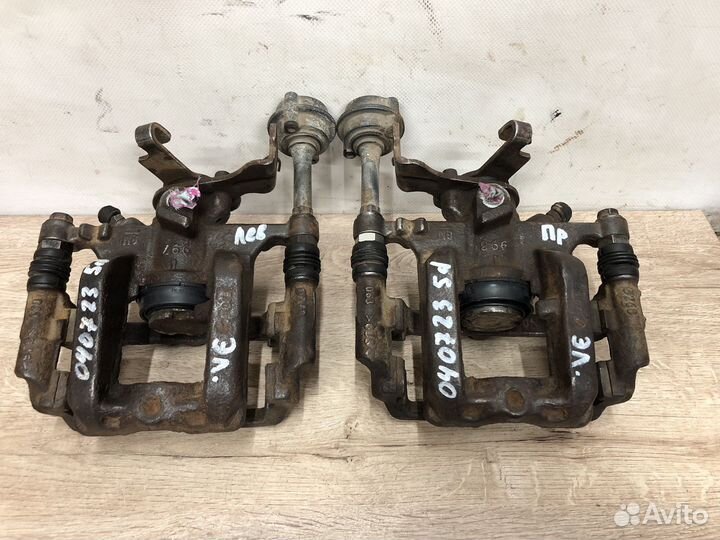 Суппорт задний Opel Astra j эл ручник