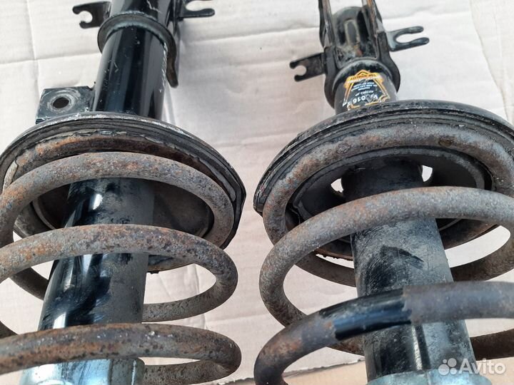 Амортизаторы передние в сборе Daewoo Nubira 2 \Део