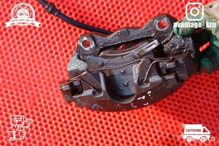 Суппорт тормозной передний левый Opel Astra H