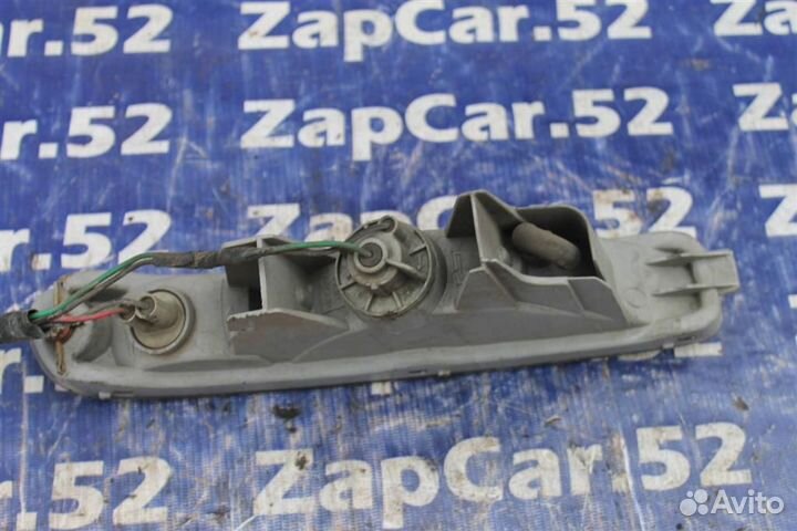 Фара противотуманная левая Мазда 323 BA ба