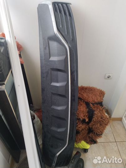 Диффузор на задний бампер Джили монжаро