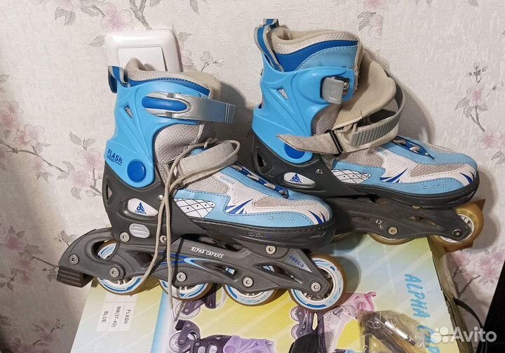 Роликовые коньки