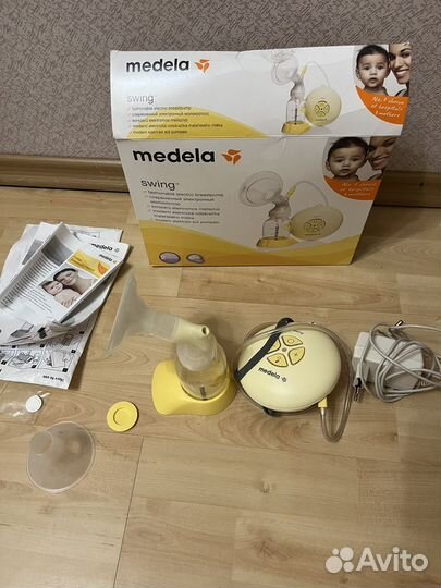 Молокоотсос medela swing электрический