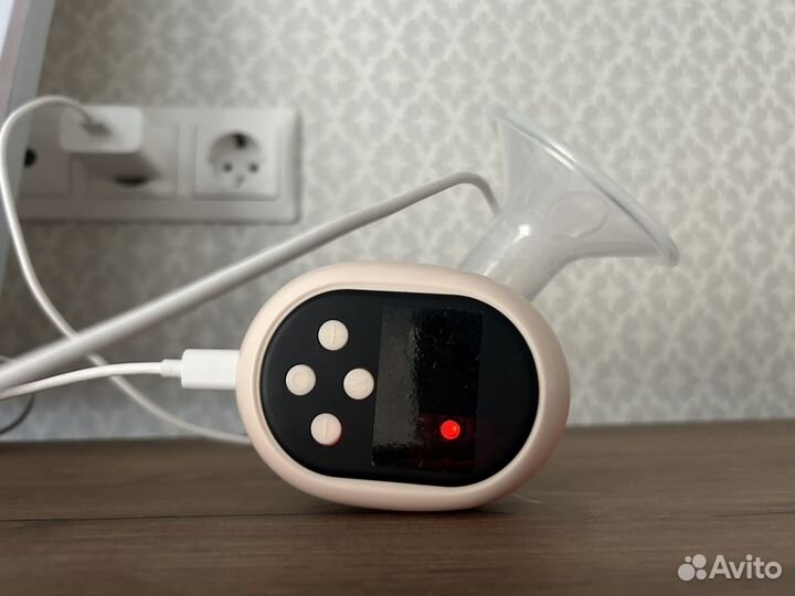 Электрический молокоотсос