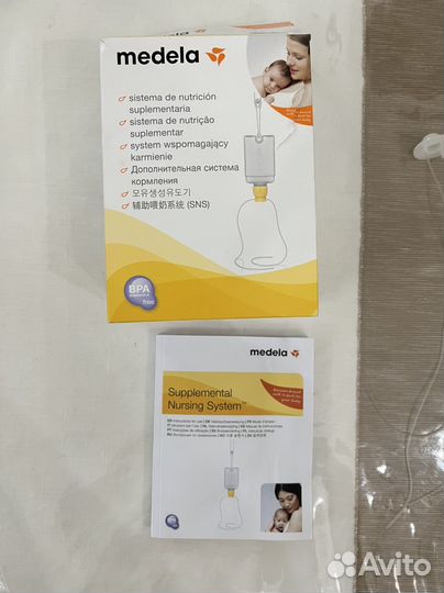 Дополнительная система для кормления medela