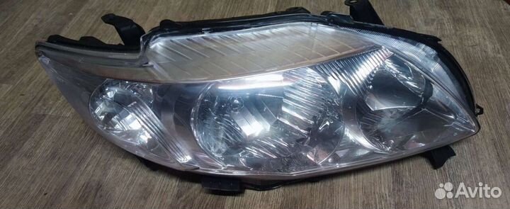 Фара правая Toyota Corolla E150