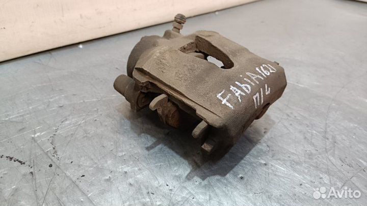 Суппорт тормозной передний левый Skoda Fabia 2