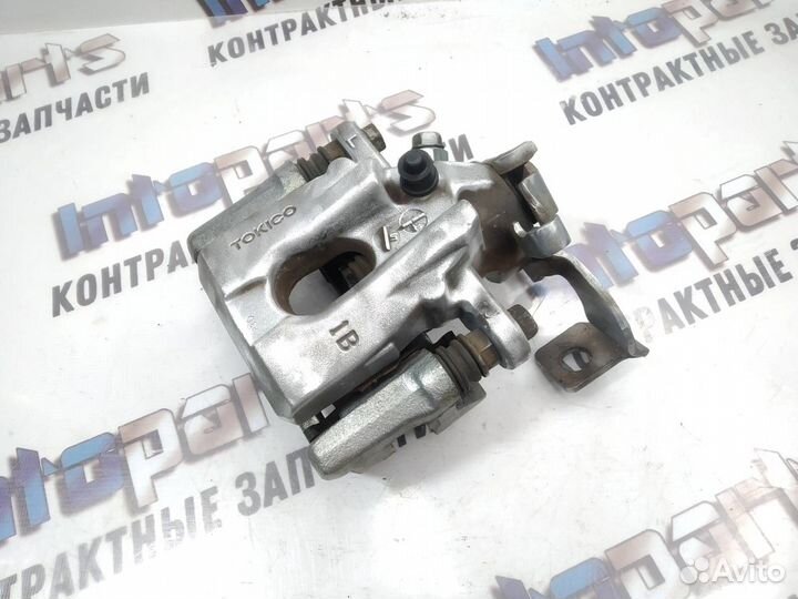 Суппорт задний левый Toyota Corolla 150