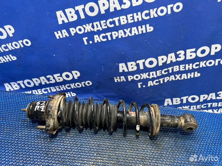 Задняя стойка амортизатора Mitsubishi Lancer 9