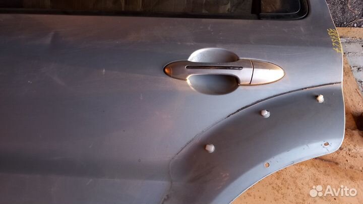 Ford Escape тайванец 2007-09 задняя левая дверь