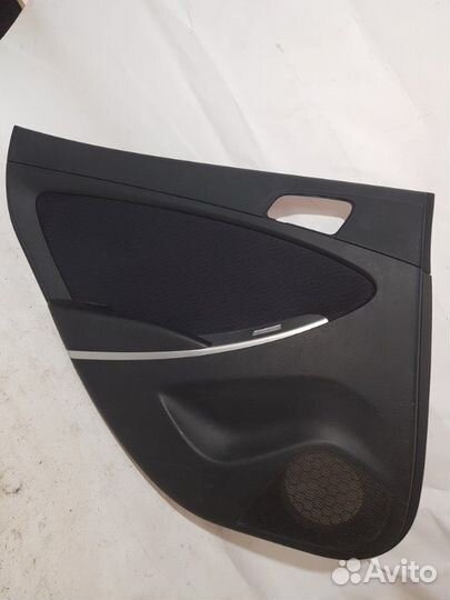 Обшивка двери задняя левая Hyundai Solaris