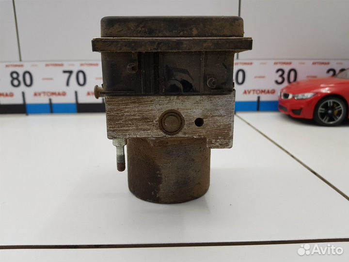 Блок ABS (насос) (Nissan Primera)