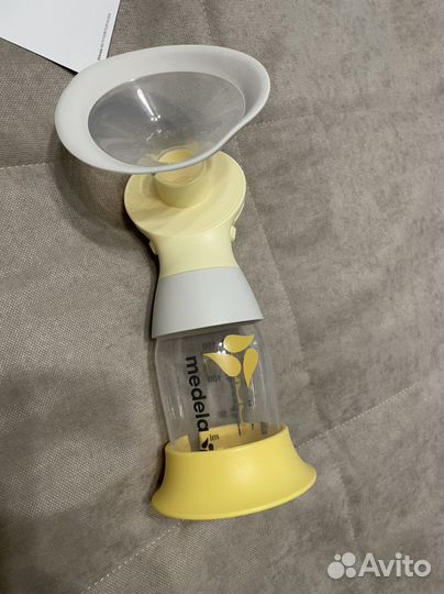 Молокоотсос medela электрический