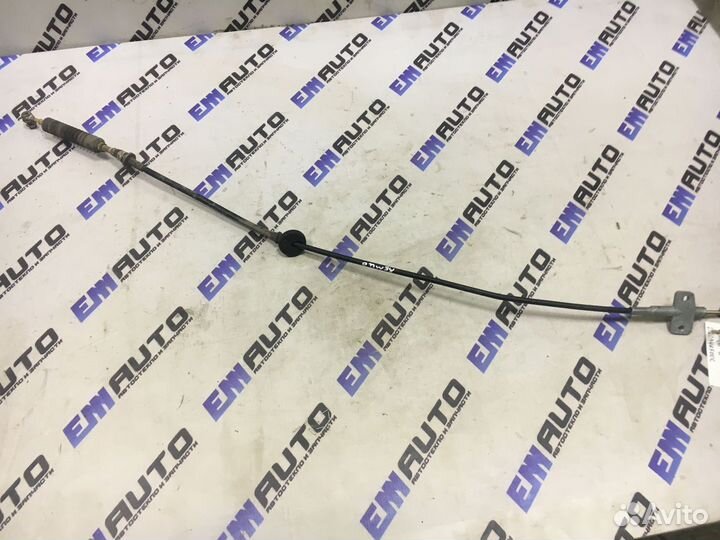 Трос кпп Мазда Демио