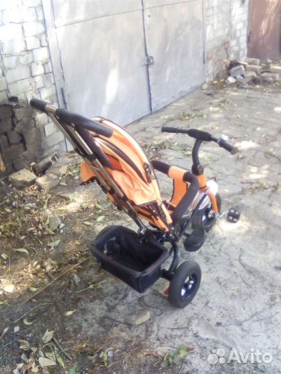 Детский трехколесный велосипед коляска