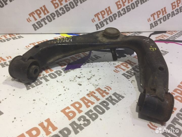 Ниссан Навара Рычаг передний левый верхний