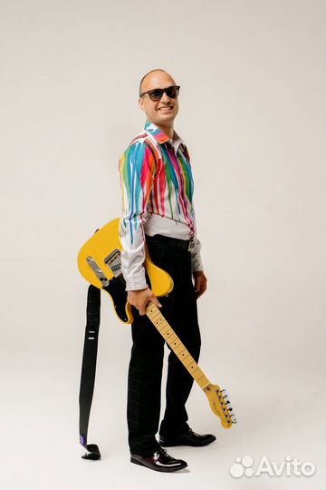 Преподаватель игры на гитаре