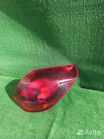 Фонарь задний правый opel astra j