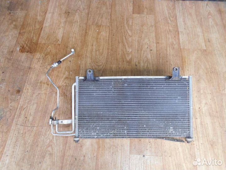 Радиатор кондиционера (конденсер) Kia Spectra 200