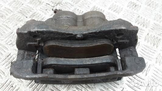 Суппорт тормозной передний левый volkswagen amarok