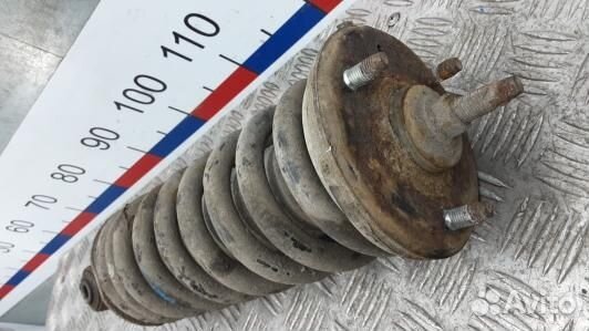 Стойка передняя левая nissan navara D40 (DEA13SJ01