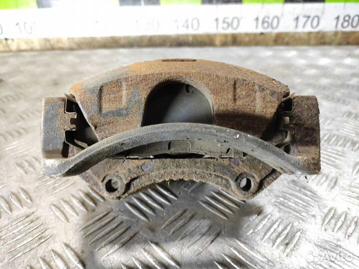 Суппорт передний правый Nissan Almera Classic