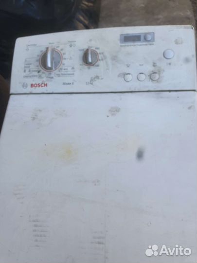 Стиральная машина с вертикаль. загруз