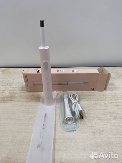 Электрическая зубная щетка