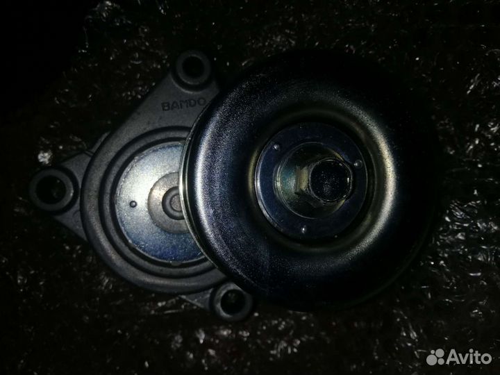 Натяжной ролик