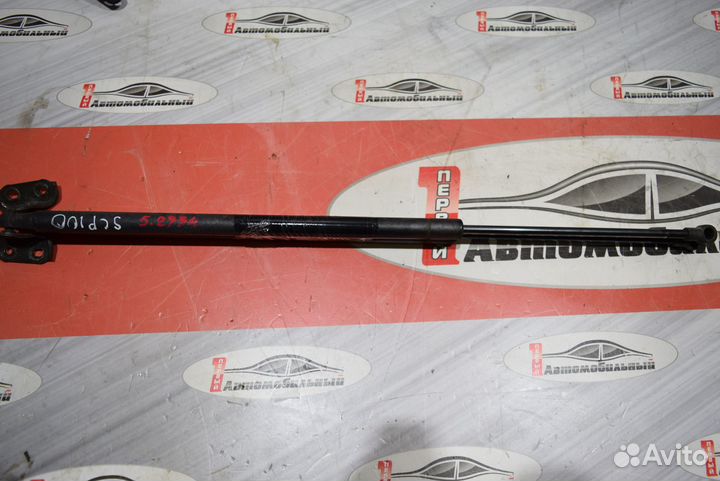 Амортизатор задней двери c Toyota Ractis SCP100 2S