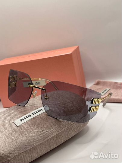 Солнцезащитные очки Miu miu