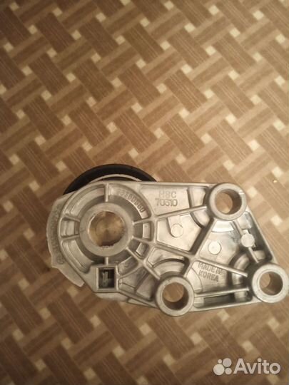 Натяжитель ремня привода