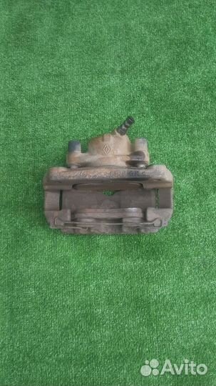 Суппорт тормозной передний правый Renault Fluence