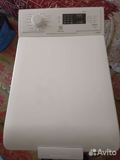 Стиральная машина с вертикальной загрузкой